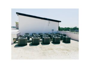 Multiple rooftop air conditioning condenser units installed on a commercial building by HP Mechanical LLC in Santa Rosa, CA.