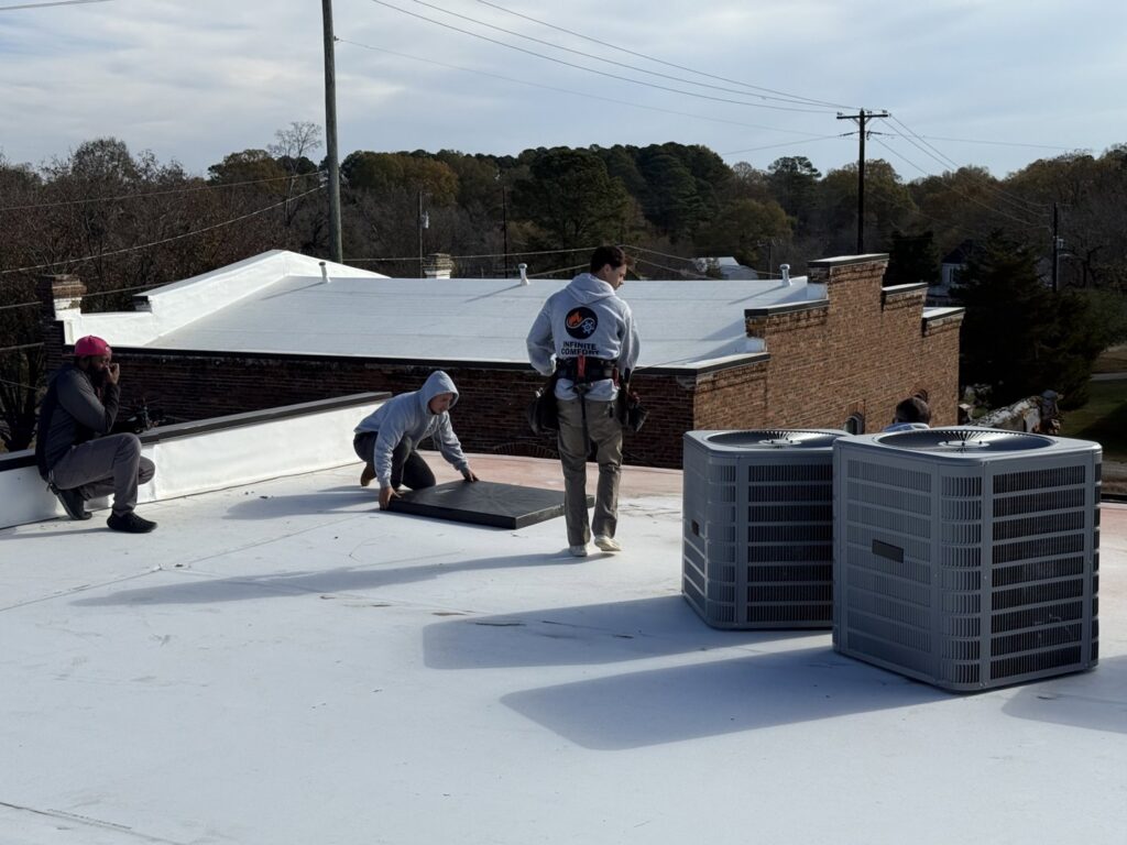 Multiple new rooftop AC units installed by Infinite Comfort in Youngsville, NC.
