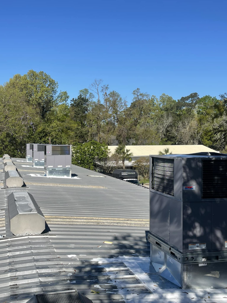 Multiple rooftop HVAC units installed on a commercial building by Wicked Cool HVAC in Charleston, SC.