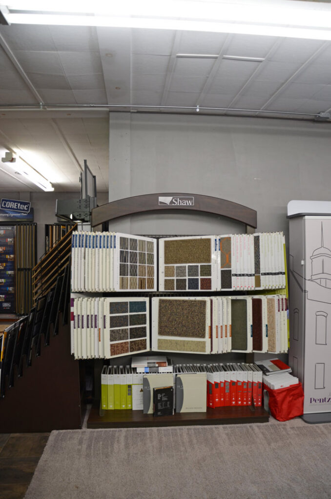 Multiple Shaw carpet sample displays arranged in the showroom of BK The Floor Store of Nebraska in Columbus, NE.