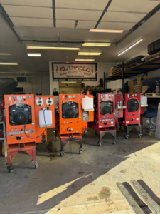 Multiple truck mount carpet cleaning machines displayed in the showroom at El Diablo Truck Mounts in Rapid City, SD.