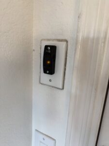 A myQ smart garage door wall control panel installed by Calavera Garage Doors in Mesa, AZ