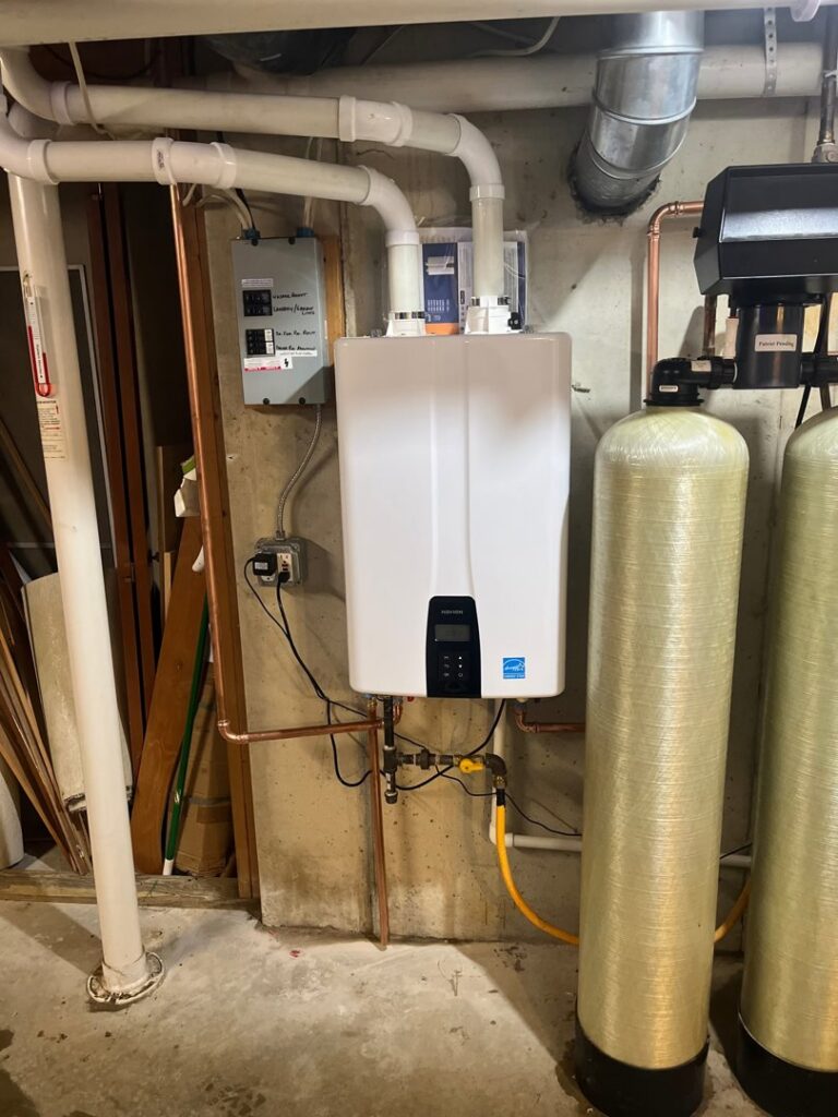A Navien tankless water heater system with water filtration by Breezy Brothers Heating and Cooling in Lafayette, IN.