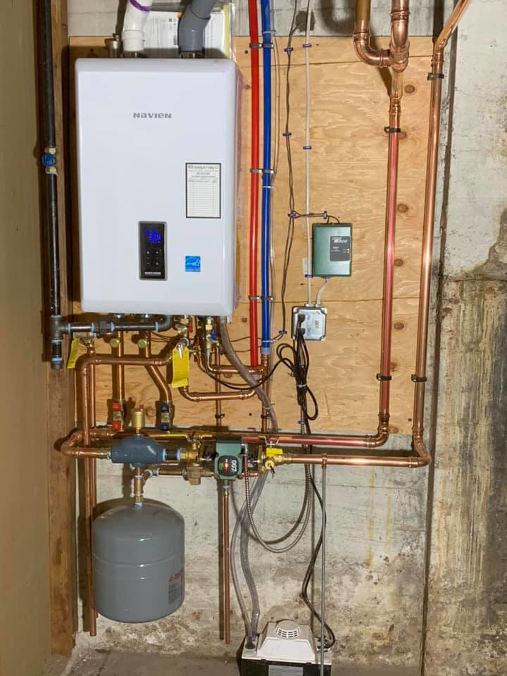 A newly installed Navien tankless water heater system with copper piping by MTL Heating and Cooling LLC in West Haven, CT