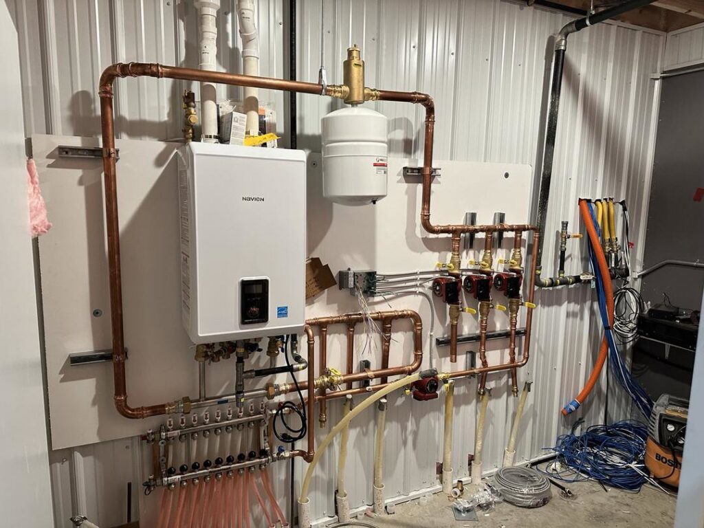 A newly installed Navien tankless water heater and manifold system by Precision Heating & Air Conditioning in Royersford, PA