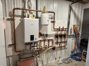 A newly installed Navien tankless water heater and manifold system by Precision Heating & Air Conditioning in Royersford, PA