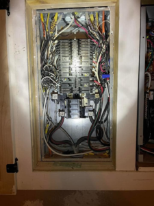 A neatly wired electrical panel, showcasing professional installation by Plug It In Electric & more in Kansas City, MO.