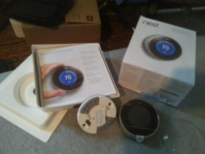 A Nest smart thermostat, ready for installation by All Pro HVAC Expertise in Columbus, OH.