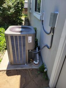 A newly installed outdoor air conditioning unit by DeHart Plumbing, Heating, & Air in Sparks, NV