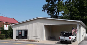 A happy couple with their new outdoor AC unit installation by George Mechanical in Charleston, WV.