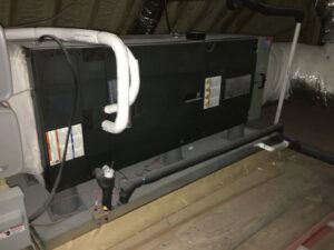 A newly installed air handler unit in an attic space by AC Heating and Air Conditioning Services in Charleston, SC.