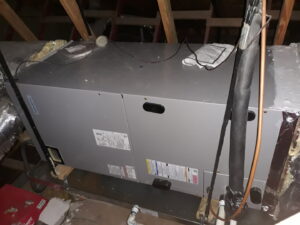 A new air handler unit installed in an attic by Go West A/C & Heating in Fort Worth, TX.