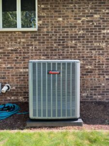 A new Amana outdoor air conditioning unit installed by DJ's Heating & Air Conditioning in Wilmington, IL.