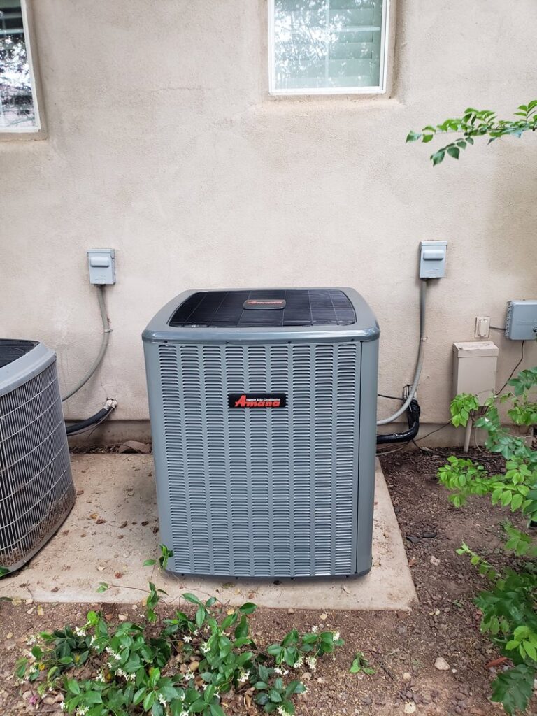 A new Amana outdoor air conditioning unit installed by Arrow Pro Services in Gilbert, AZ