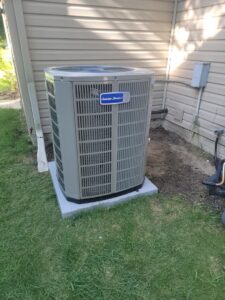 A newly installed American Standard outdoor air conditioning unit by Shrek Heating & Air Conditioning in Toledo, OH.