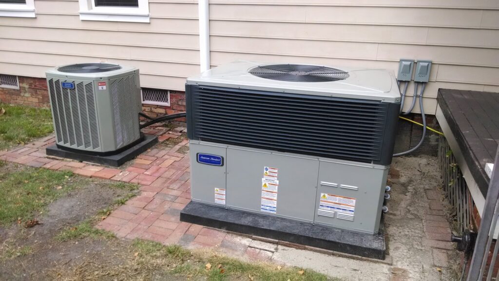 Newly installed American Standard outdoor HVAC units by Foust Heating & Air Conditioning in Fayetteville, NC.