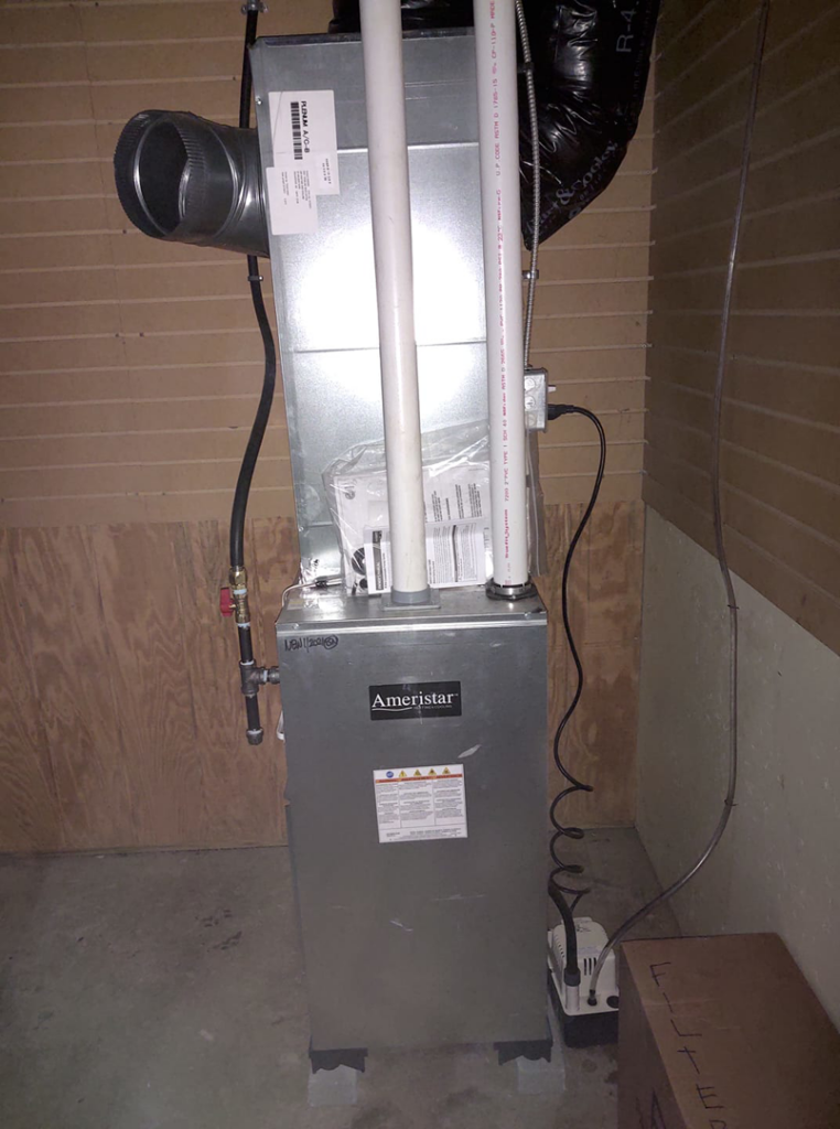 A newly installed Ameristar furnace and air handler unit by SM Heating and Cooling in Rochester, NY