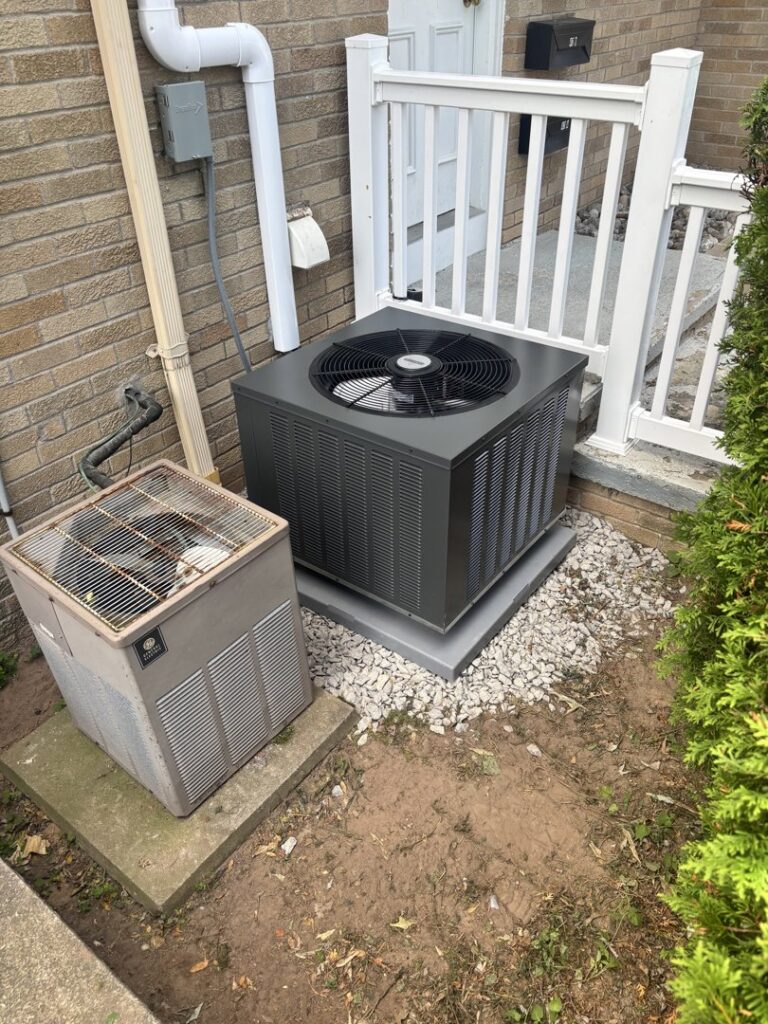New and old outdoor AC units, showcasing replacement services by Frank N Frank Mechanical Contractors in Rochester, NY.