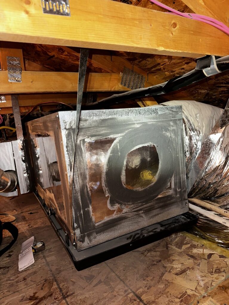 A newly installed air handler unit in an attic by Dakine Heating & Cooling, LLC in Las Vegas, NV.