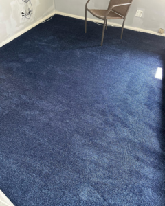 New blue carpet installation in a room by Jimenez Carpet in Lynwood, CA