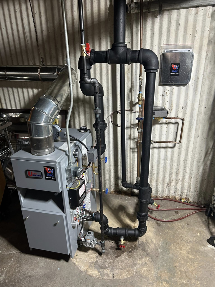 A new boiler and furnace system installation with extensive piping by Controlled Weather HVAC in Shelby Township, MI.