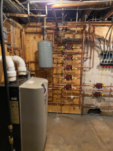 A new boiler and extensive copper piping installation in a basement by RSC Heating and Air Conditioning in Lancaster, PA.