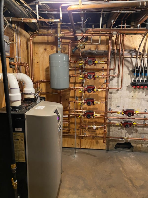 A new boiler and extensive copper piping installation in a basement by RSC Heating and Air Conditioning in Lancaster, PA.