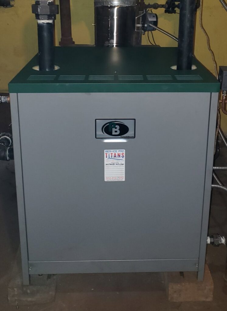 A newly installed boiler unit with a Service Pro Titans sticker, indicating service in Chicago, IL.