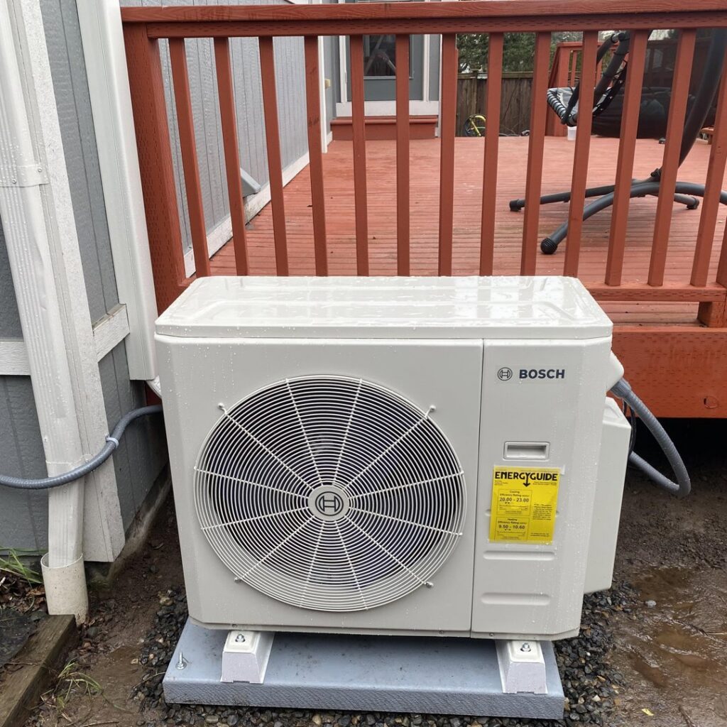 A newly installed Bosch heat pump outdoor unit by JN Heating & Cooling in Eure, NC