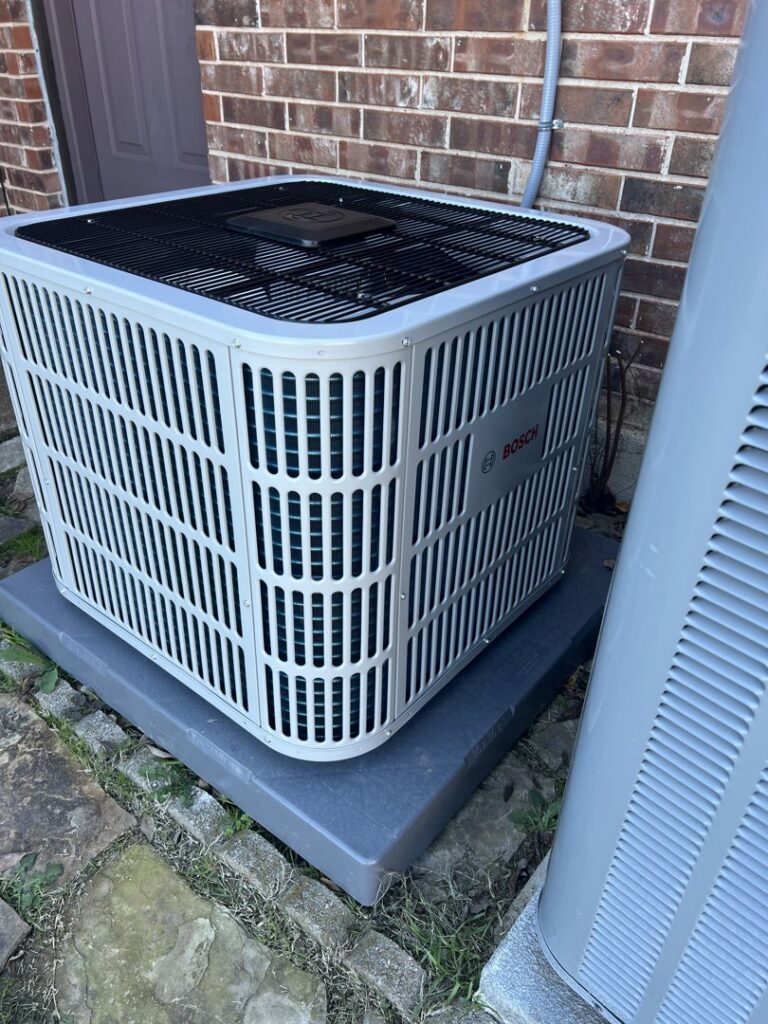 A newly installed Bosch outdoor air conditioning unit by One Hour Air Conditioning & Heating of Fort Worth, TX.