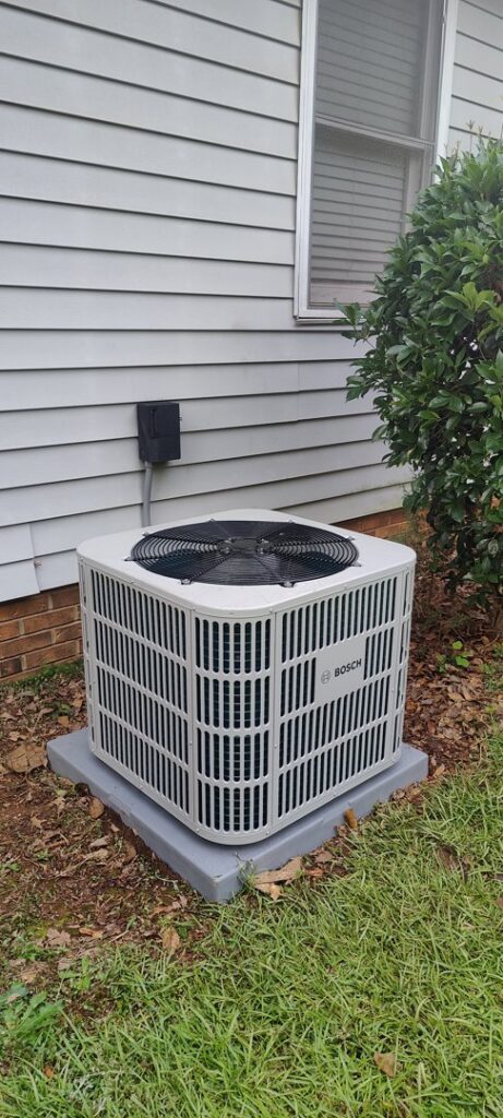A newly installed Bosch outdoor air conditioning unit by Icy Hot HVAC in Spartanburg, SC