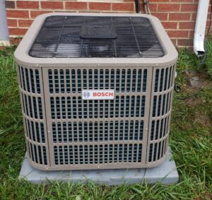 A newly installed Bosch outdoor HVAC unit by Booker Heating & Air in Richmond, VA.