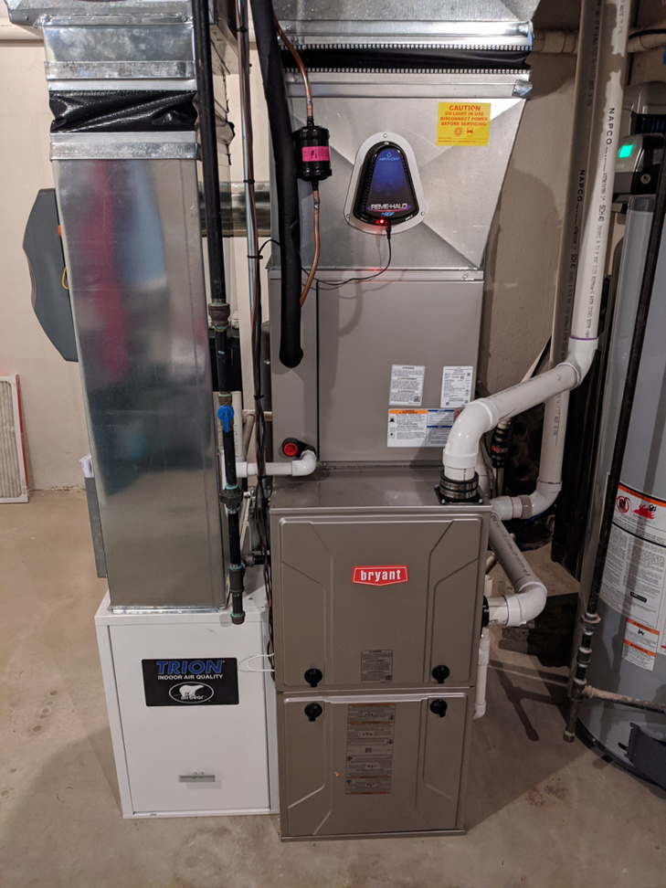 A newly installed Bryant furnace and Trion air quality system by Proficient Heating & Cooling in Livonia, MI.