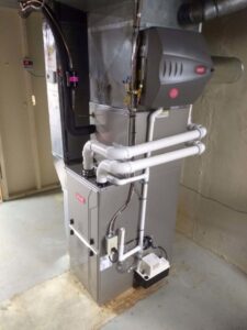 A new Bryant furnace installation with extensive PVC piping and ductwork by Proficient Heating & Cooling in Livonia, MI.