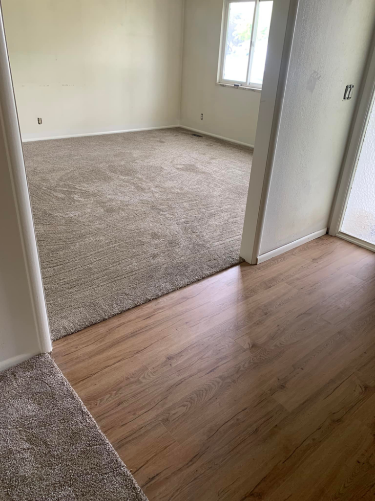 A room featuring new carpet installation by Tony's Floor Covering Installation and Sales in Boise, ID.