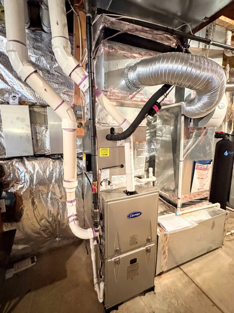 A new Carrier furnace and air handler installation with ductwork by Residential Express Heating & Air in Sterling, VA.