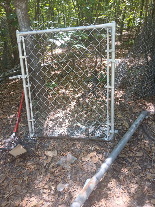A new chain-link fence gate ready for installation by Jen and Vince and the PreOwned Fence in Augusta, GA.