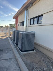 Newly installed commercial AC units outside a building by Gotham Air LLC in Glendale, AZ.