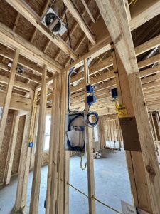 Electrical rough-in wiring and junction boxes installed in a new construction home by Babcock Electric & Communications in Lake Charles, LA.