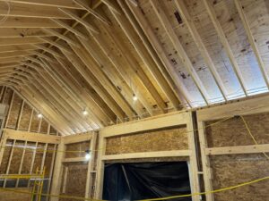 New construction electrical rough-in with temporary lighting and wiring installed by Rudis Electrical LLC in Scranton, PA.