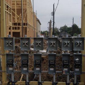 New construction electrical service installation with multiple meter bases by Ark Electrical Service in Tomball, TX