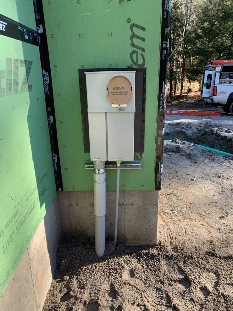 Electrical meter and service disconnect installed on a new construction building by Building Connections LLC in Auburn, ME.