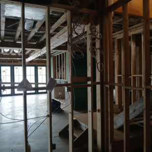 Essential Electric LLC performing new construction electrical wiring in a framed building in Lancaster, KY.