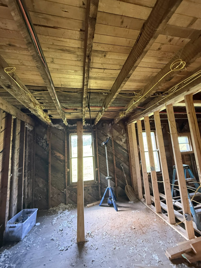 Electrical wiring running through exposed ceiling joists during new construction by Power House Electrical LLC in Johnson City, TN