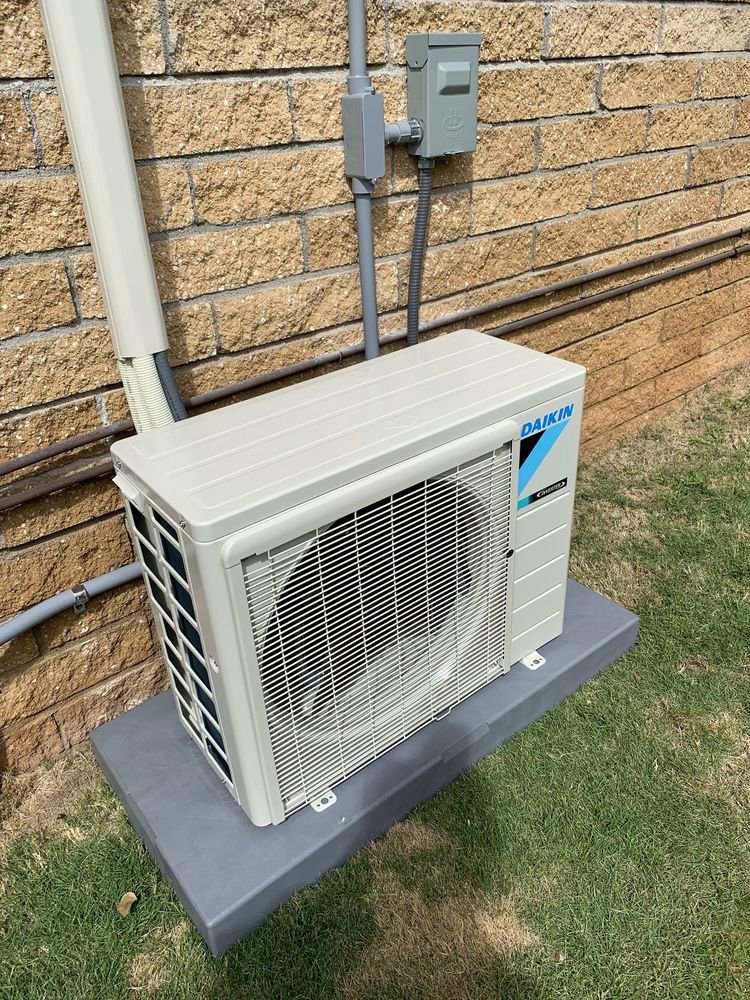A newly installed Daikin HVAC outdoor unit by Ultimate Air Conditioning, ready for use in Pearl City, HI