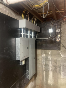 New electrical panel and conduit installation by EO Ross Electrical Contractors Inc. in Springfield, MA.
