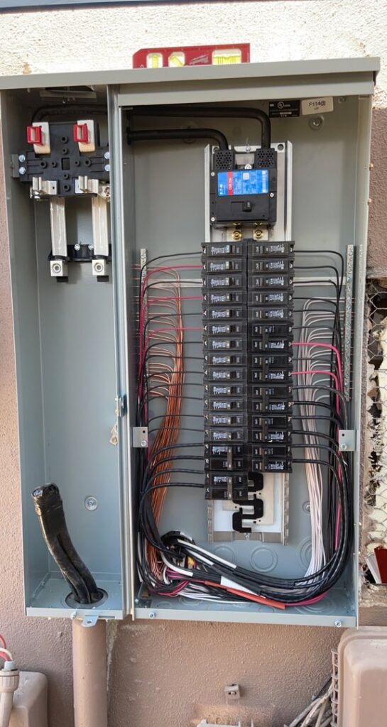 A new electrical panel installation with circuit breakers and wiring by G5 Electric LLC in Phoenix, AZ