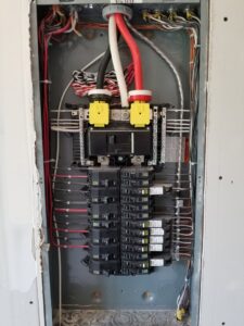 A newly installed and neatly wired electrical panel with circuit breakers by York Electrical Services in York, PA.