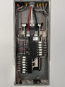 A new electrical panel with labeled circuit breakers and neat wiring installed by F&C Electrical Services LLC in Iowa City, IA.