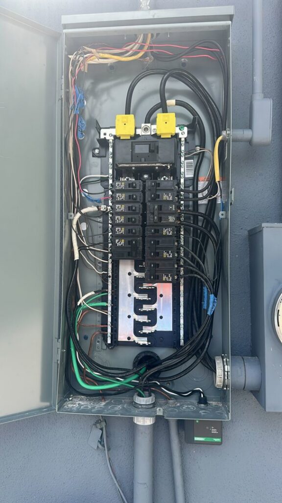 A newly installed and neatly wired electrical panel by PlugTech LLC in Orlando, FL
